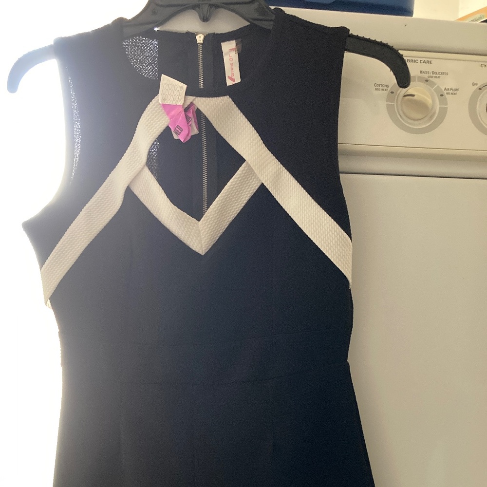 SUPER CUTE. BRAND NEW…NEVER WORN. Juniors romper